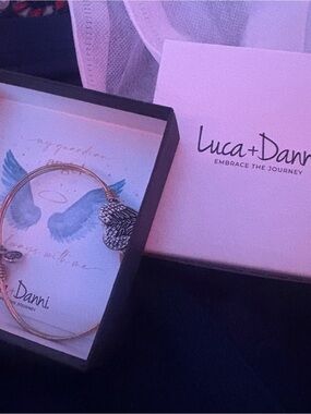 Luca + Danni Gold Tone Angel Wing Bangle with Silver Wing Detail